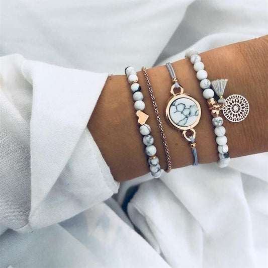 4 Charming Ways To Style Your Favorite Charm Bracelets